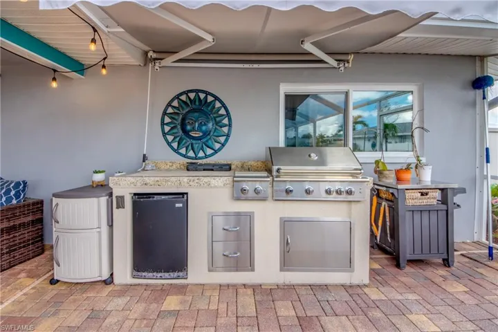 Lanai with outdoor kitchen