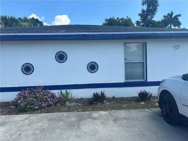 View of home's exterior with stucco siding