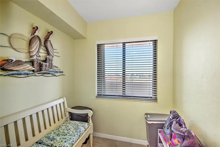 Bedroom featuring light tile patterned flooring