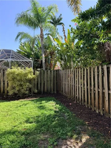View of fenced backyard