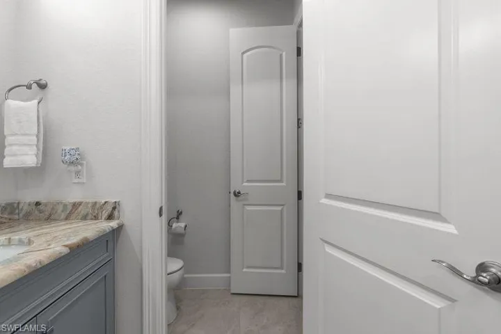 Bathroom with vanity and toilet