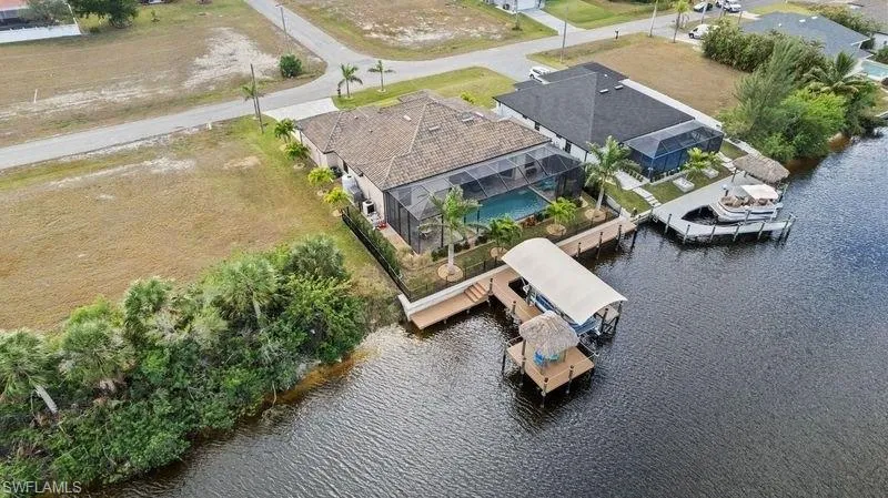 Aerial view featuring a water view