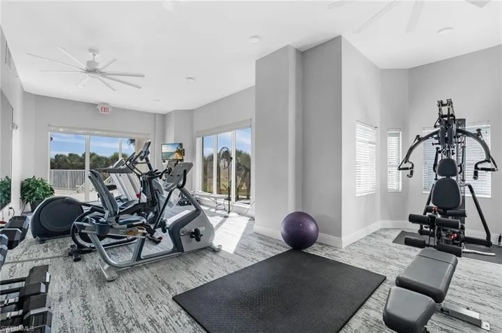 Workout area featuring a ceiling fan