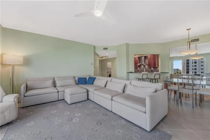 Tiled living room with ceiling fan