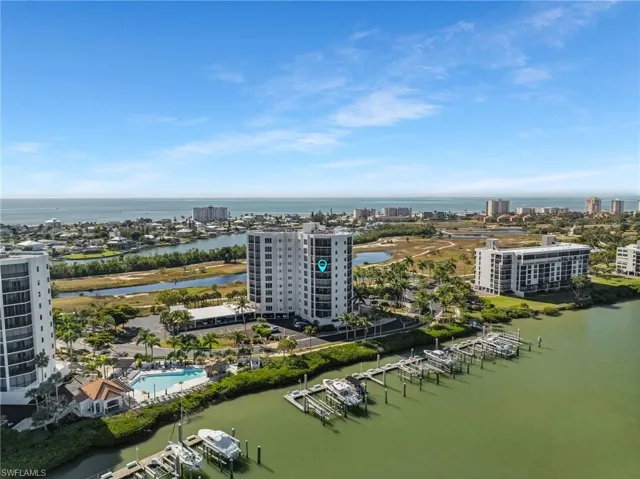 Bayfront condo with views of the pool and Bay