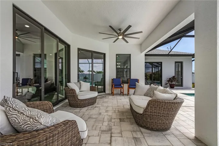 View of patio / terrace featuring ceiling fan and an outdoor hangout area