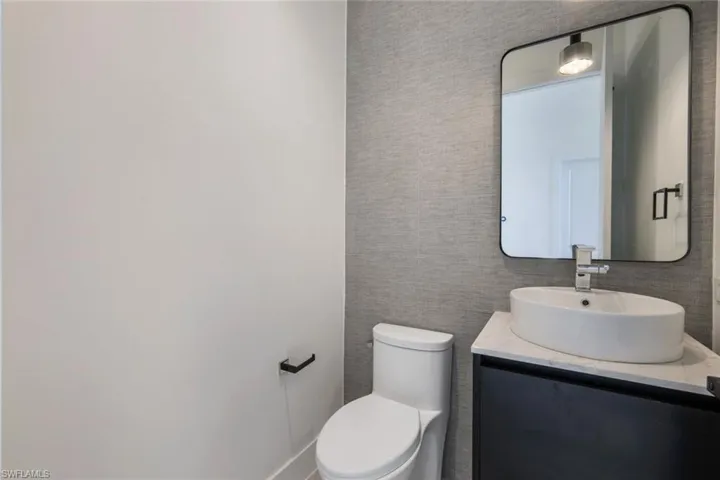 Bathroom with vanity and toilet