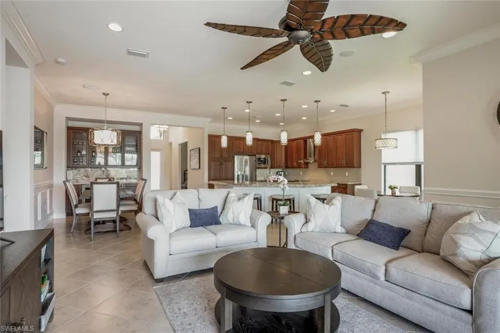 • Gourmet kitchen includes upgraded custom cabinetry and high-end appliances: Wolf inductionrange, Monogram vented hood, microwave, Miele dishwasher