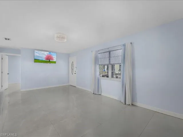 Empty room with baseboards