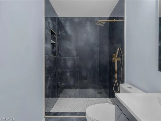 Full bathroom featuring vanity and a walk in shower