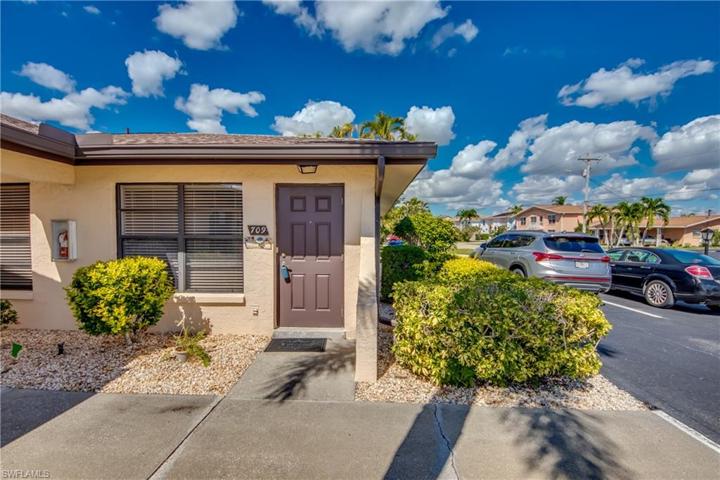 Front door with parking spot to the right