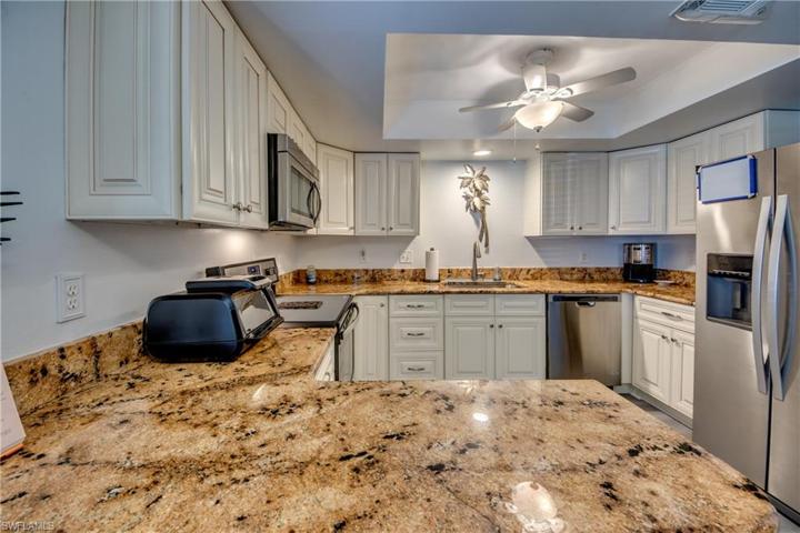 High End Granite /white cabinets