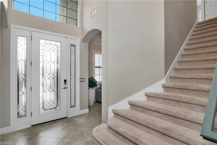 Entrance foyer with a wealth of natural light and tile floors