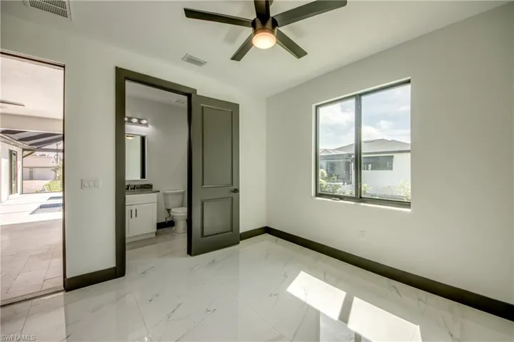 ensuite bathroom/ directly off the pool and or Flex Space - Unique Ensuite mother in law suite/ flex space- with a full bathroom- directly off the pool and outdoor kitchen area.