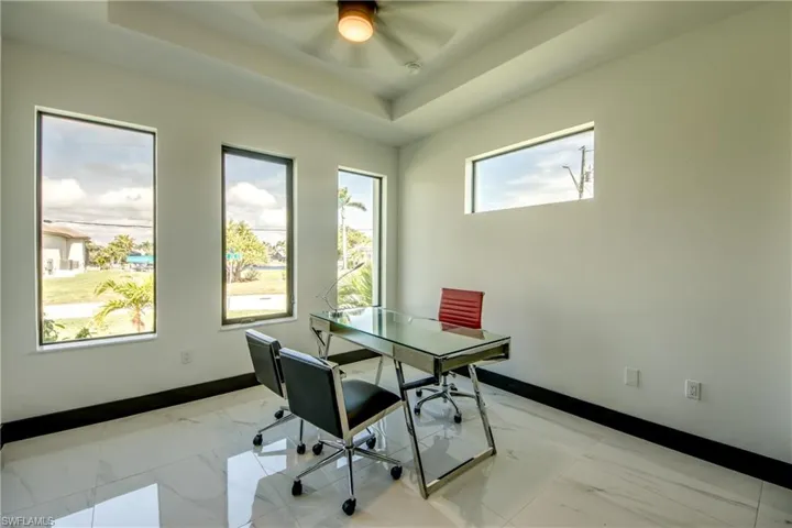 Office space or bedroom with full closet- vaulted ceilings - and lots of natural light