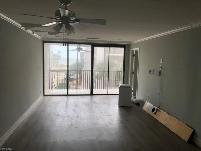 Ceiling and some wall damage in living room from temp roof leak Fall of 2023.