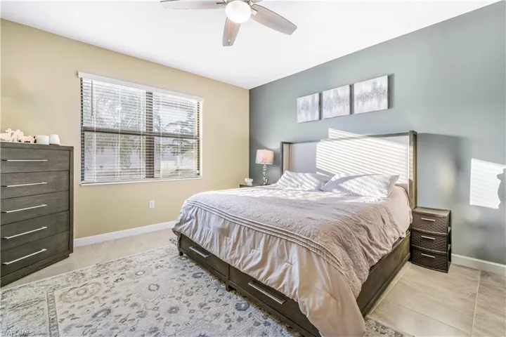 Bedroom featuring baseboards and a ceiling fan