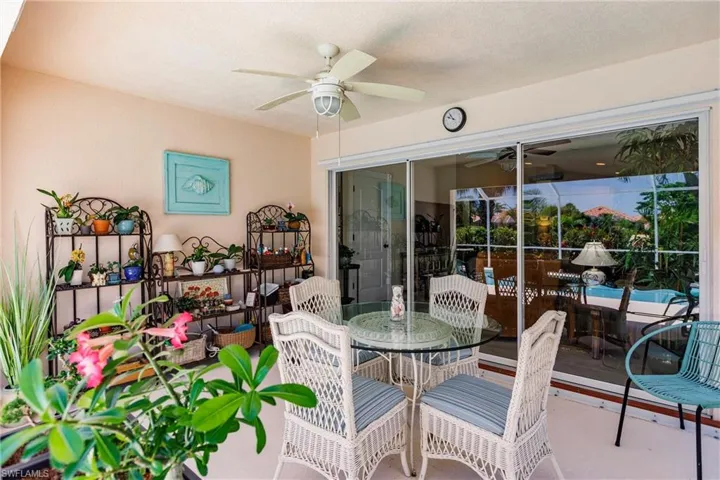 Covered lanai is true outdoor Naples living.