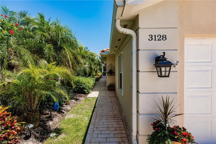 Attractive tropical landscaping greets you.