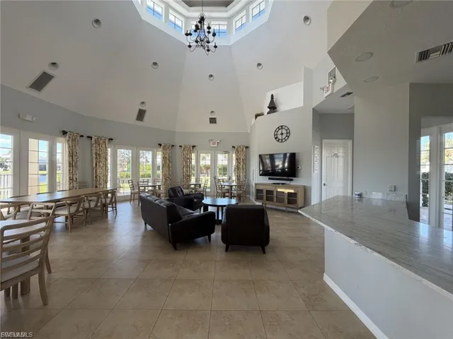 Community Living Area With Kitchen and Dining Next to the Pool.