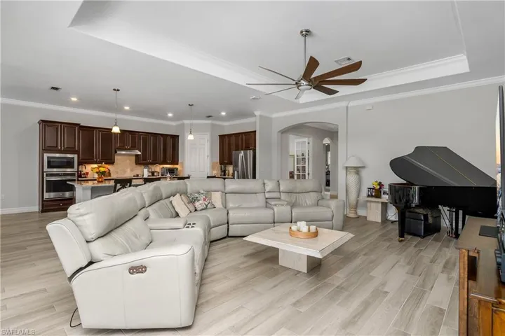 Open view to Kitchen and Den /Office with French Doors