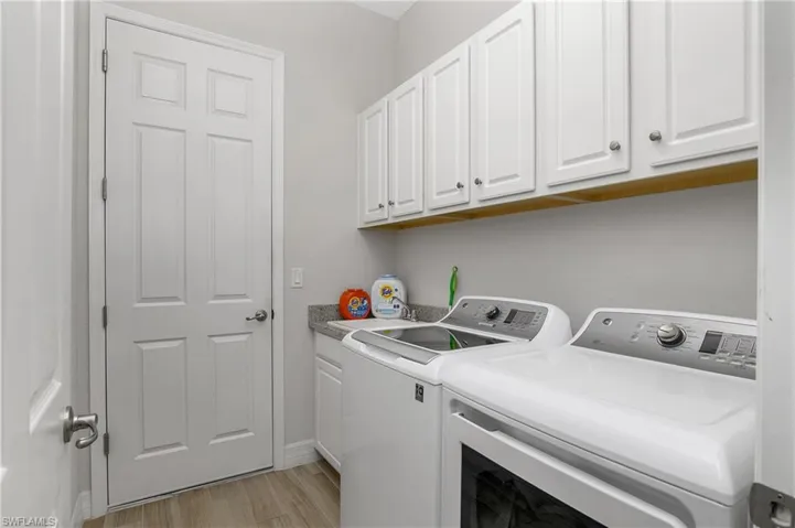 Plenty of cabinet Space on way to Garage