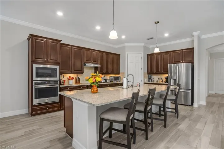 Gorgeous Cherry Cabinetry and Stainless Steel Appliances