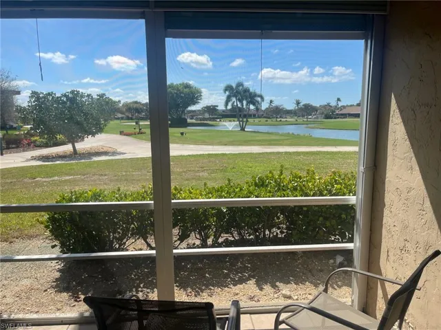 View of Golf Course and Lake from Screened-In Lanai