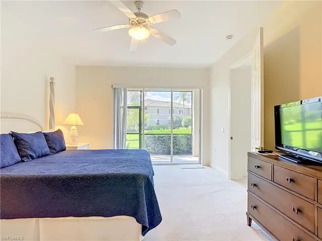 Room with light neutral wall paint and carpeting