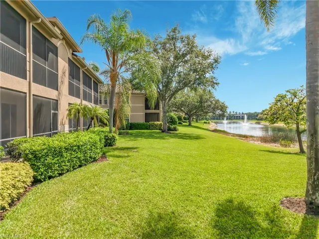 Expansive green lawn with mature landscaping