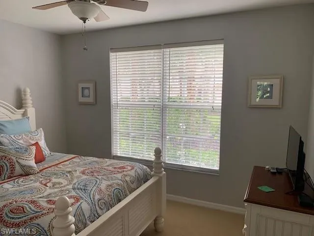 Bedroom featuring carpet floors and a ceiling fan
