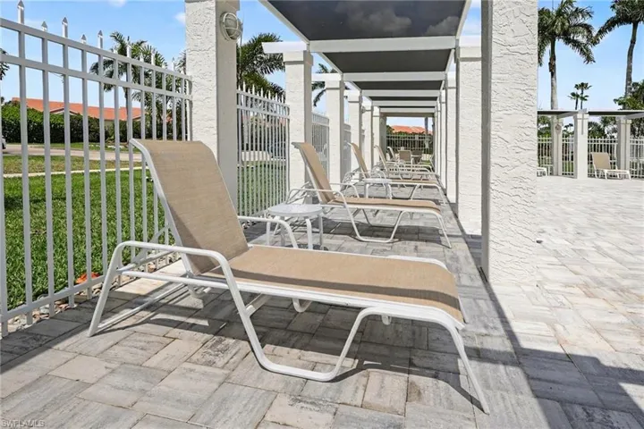Lounge by the beautiful, newly renovated zero entry pool at the community clubhouse