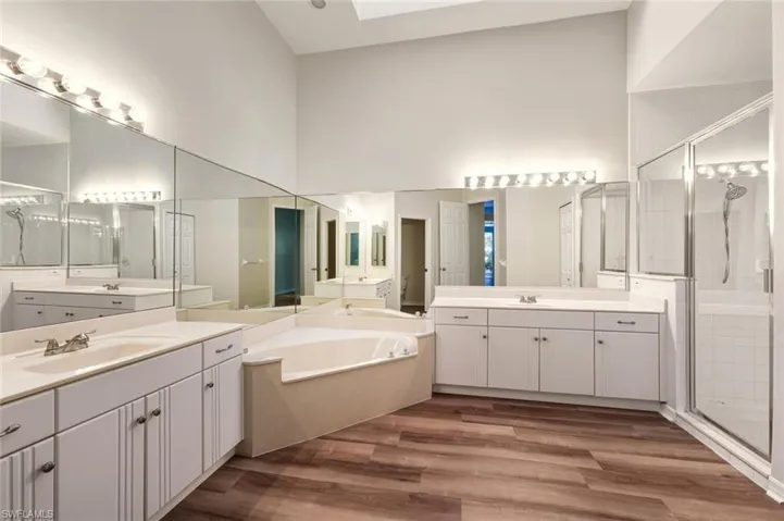 Staged Quest Bath - Full bath featuring vanity and bathing tub / shower combination