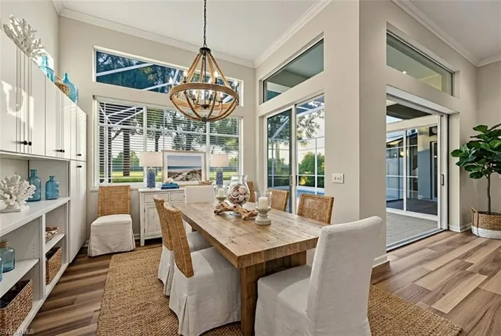 Totally Renovated Clubhouse & Dining space with lofted ceiling and a chandelier