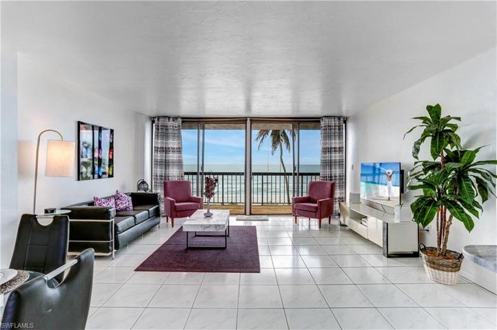 Right on the sand...floor to ceiling sliders for the most stunning views!