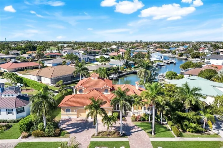 Aerial view of residential area with a nearby body of water