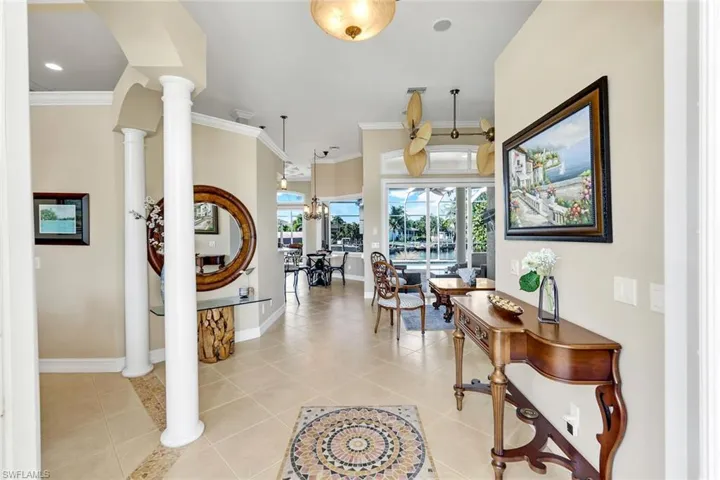 Entryway with french doors opens to a sirene home with a view