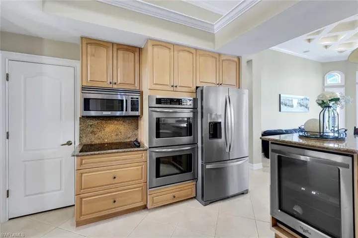 Kitchen with double oven, wine cooler, large walk in pantry.
