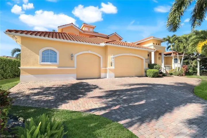 4 Car Garage - one rear facing overhead door.