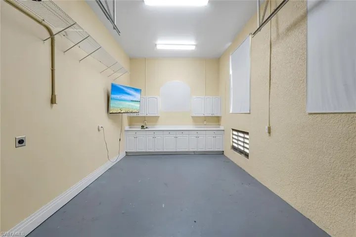 4th garage. Rear facing overhead door. Workshop/Mancave/ Storage