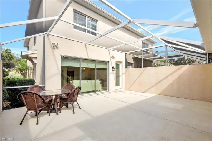 View of patio / terrace with a lanai