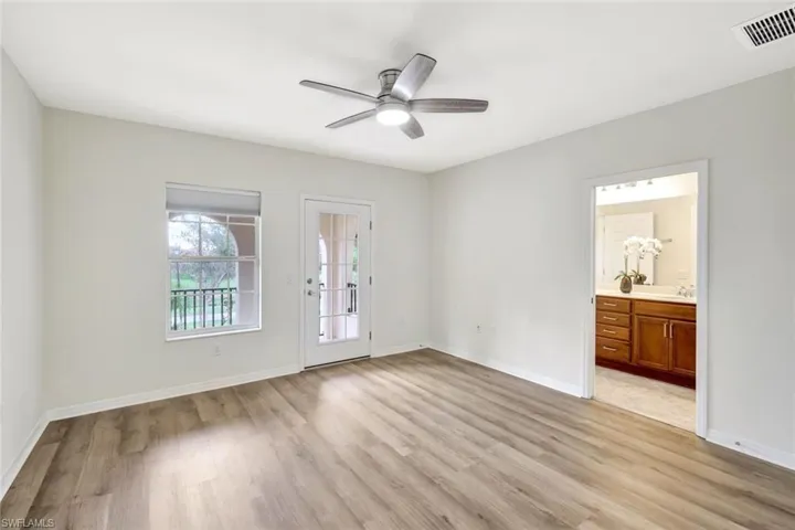 Unfurnished room featuring light hardwood / wood-style flooring and ceiling fan