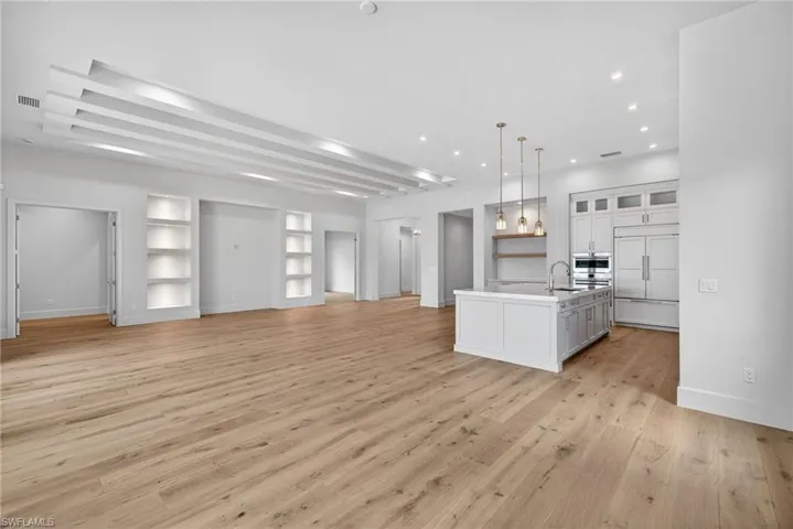 Large bright open concept floor plan has great flow for family gatherings and entertaining