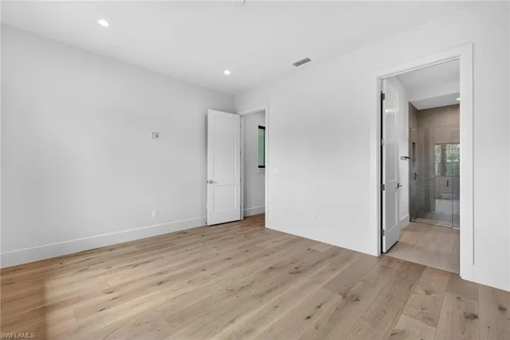 Bedroom 2 with en suite bathroom and walk-in closet