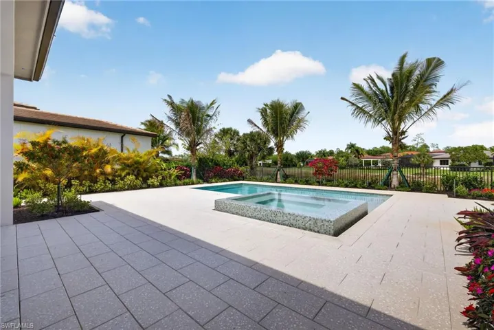 Pool deck area is spacious for lounging in or out of sun