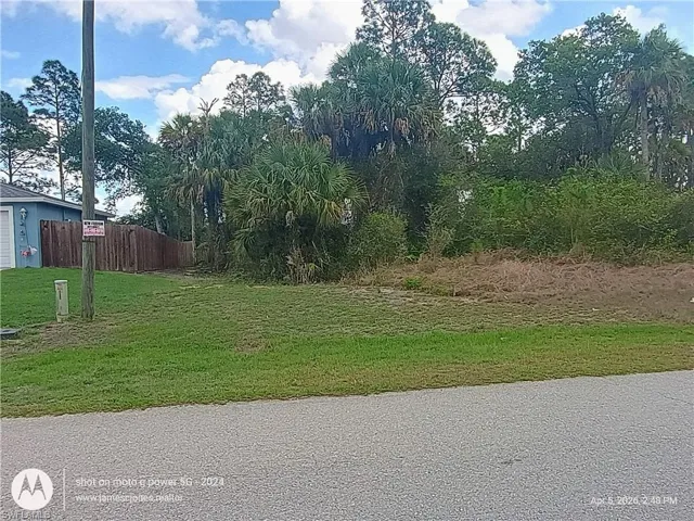 Corner of lot, home on left is 6007