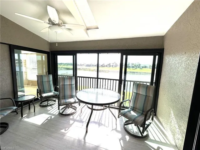 Tiled lanai with skylight and impact rated enclosure with the option to open for fresh air.