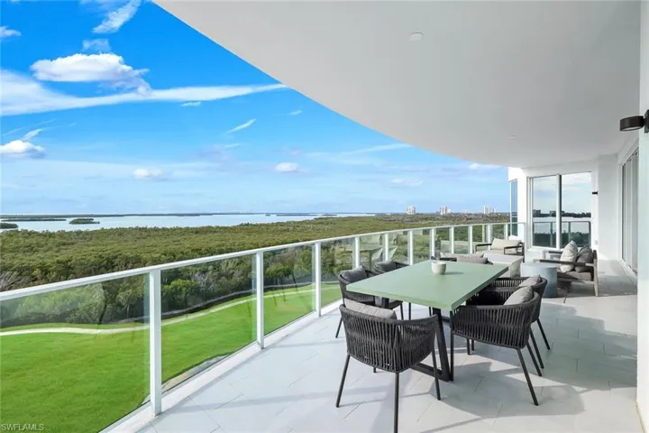 The expansive private balcony offers a seamless extension of the living space, embodying the essence of Florida’s indoor-outdoor lifestyle.