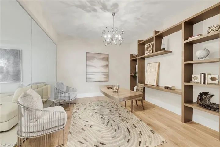 Custom wood built-ins define the office, perfectly positioned in close proximity to the guest bedrooms and adjacent den.