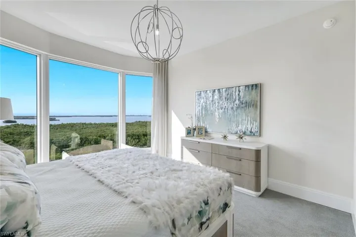 The guest suite is complemented by captivating water views.